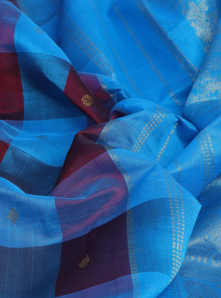 Silk cotton saree maroon and cs blue with allover paalum pazhamum checks & zari buttas and rich zari woven border