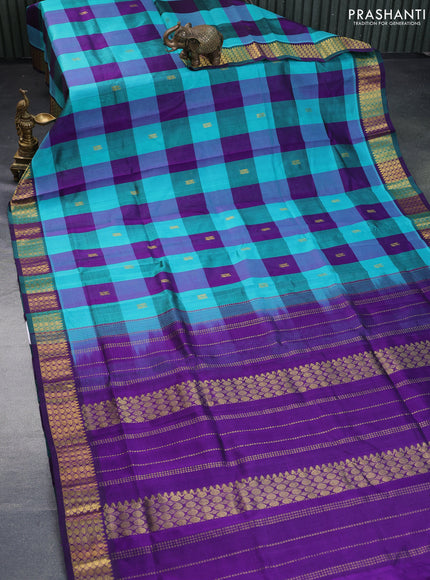 Silk cotton saree teal blue and violet with allover paalum pazhamum checks & zari buttas and rich zari woven border