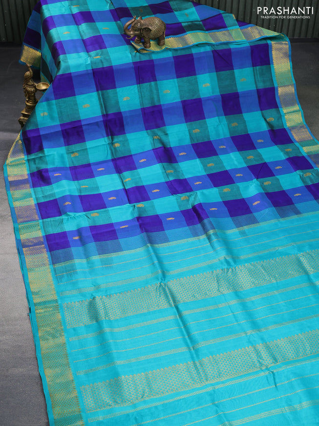 Silk cotton saree blue and teal blue with allover paalum pazhamum checks & zari buttas and rich zari woven border