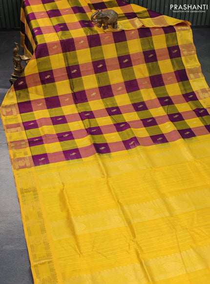 Silk cotton saree purple and yellow with allover paalum pazhamum checks & zari buttas and rich zari woven border