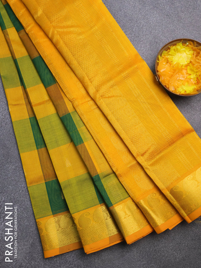 Silk cotton saree green and mango yellow with allover paalum pazhamum checks & zari buttas and paisley zari woven border