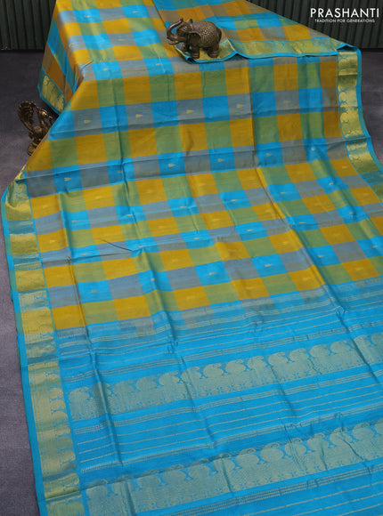 Silk cotton saree mustard yellow and teal blue with allover paalum pazhamum checks & zari buttas and paisley zari woven border