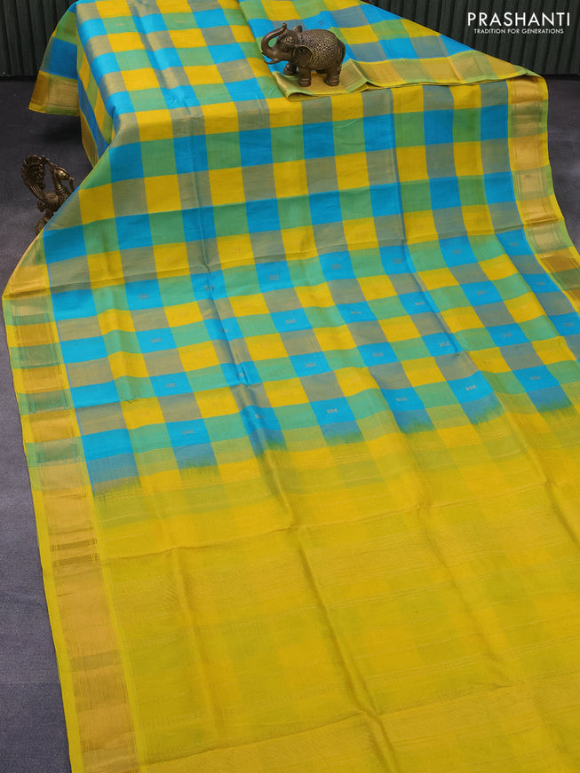 Silk cotton saree teal blue and yellow with allover paalum pazhamum checks & zari buttas and zari woven border