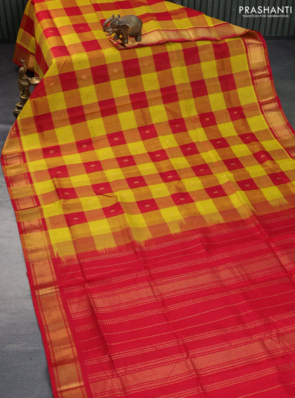 Silk cotton saree yellow and red with allover paalum pazhamum checks & zari buttas and zari woven border