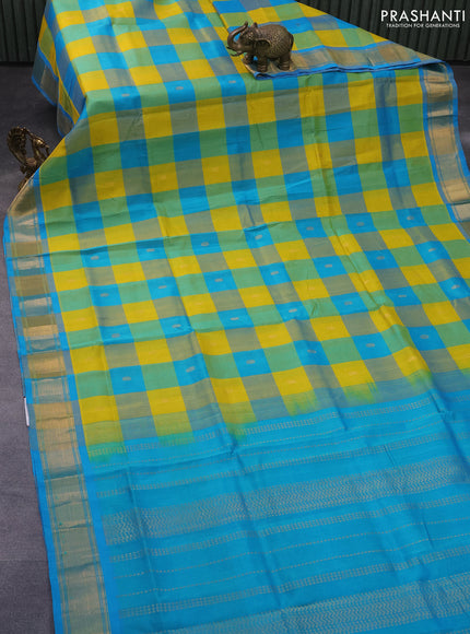 Silk cotton saree yellow and teal blue with allover paalum pazhamum checks & zari buttas and zari woven border