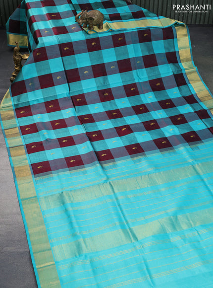 Silk cotton saree deep maroon and teal blue with allover paalum pazhamum checks & zari buttas and zari woven border