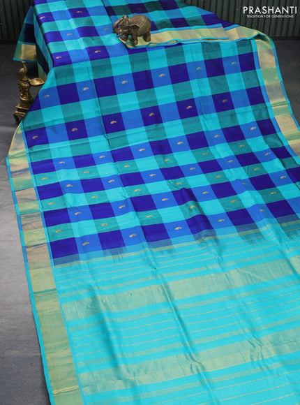 Silk cotton saree blue and teal blue with allover paalum pazhamum checks & zari buttas and zari woven border