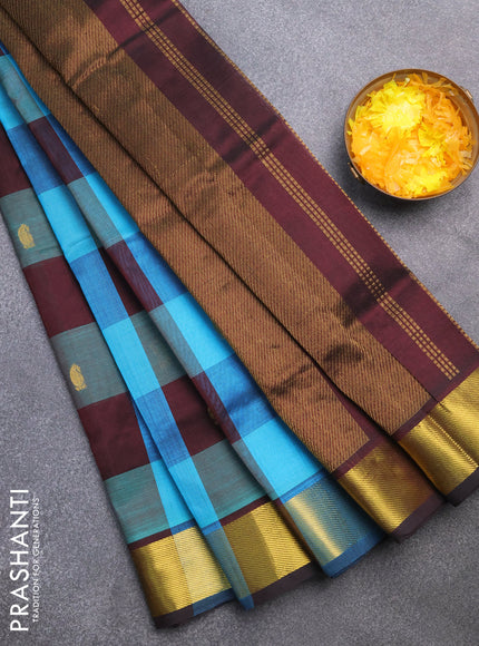 Silk cotton saree cs blue and deep coffee brown with allover paalum pazhamum checks & zari buttas and zari woven border