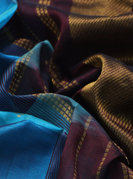 Silk cotton saree cs blue and deep coffee brown with allover paalum pazhamum checks & zari buttas and zari woven border