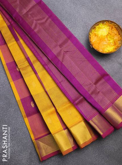 Silk cotton saree mango yellow and purple with allover paalum pazhamum checks & zari buttas and zari woven border