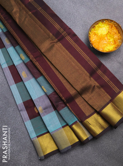 Silk cotton saree teal blue and deep coffee brown with allover paalum pazhamum checks & zari buttas and zari woven border