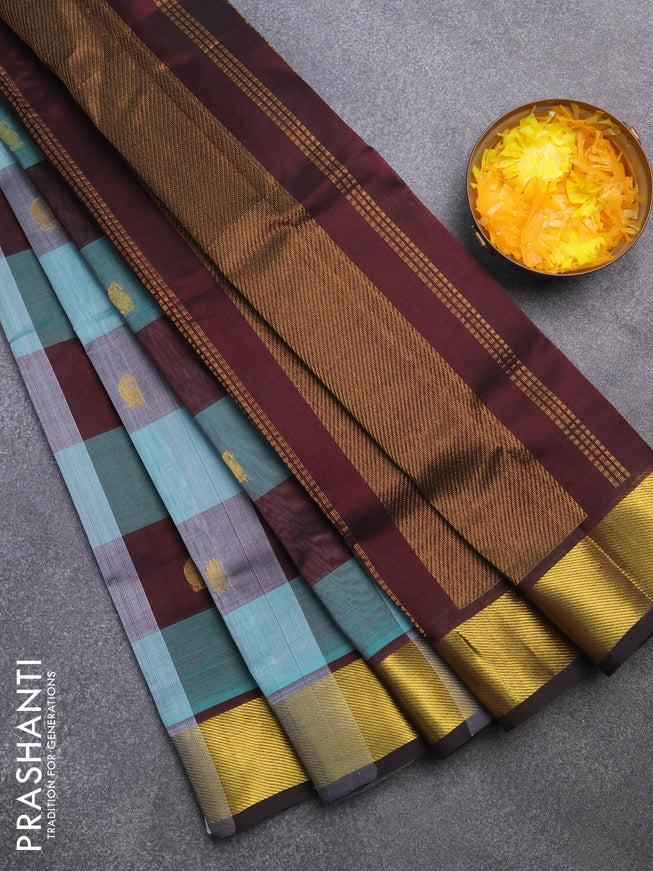 Silk cotton saree teal blue and deep coffee brown with allover paalum pazhamum checks & zari buttas and zari woven border