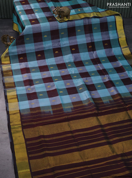 Silk cotton saree teal blue and deep coffee brown with allover paalum pazhamum checks & zari buttas and zari woven border