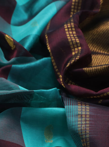 Silk cotton saree teal blue and deep brown with allover paalum pazhamum checks & zari buttas and zari woven border