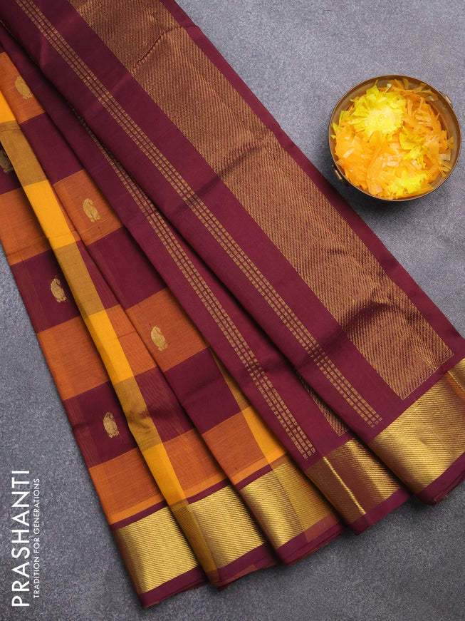 Silk cotton saree mustard yellow and wine shade with allover paalum pazhamum checks & zari buttas and zari woven border