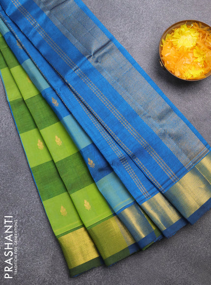 Silk cotton saree light green and peacock blue with allover paalum pazhamum checks & zari buttas and zari woven border