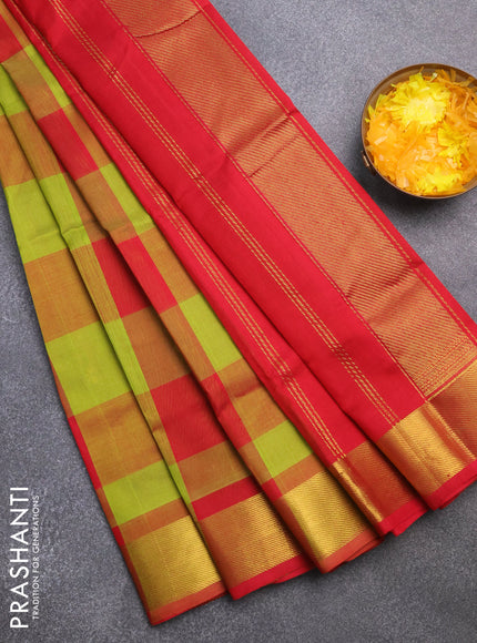 Silk cotton saree light green and red with allover paalum pazhamum checks & zari buttas and zari woven border