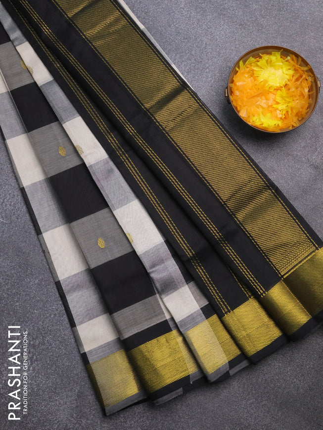 Silk cotton saree cream and black with allover paalum pazhamum checks & zari buttas and zari woven border