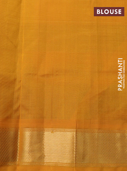 Silk cotton saree green and mango yellow with allover paalum pazhamum checks & zari buttas and zari woven border