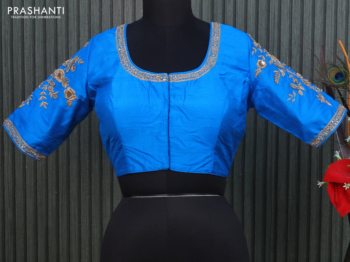 Raw silk readymade blouse cs blue with allover zardosi work and back knot