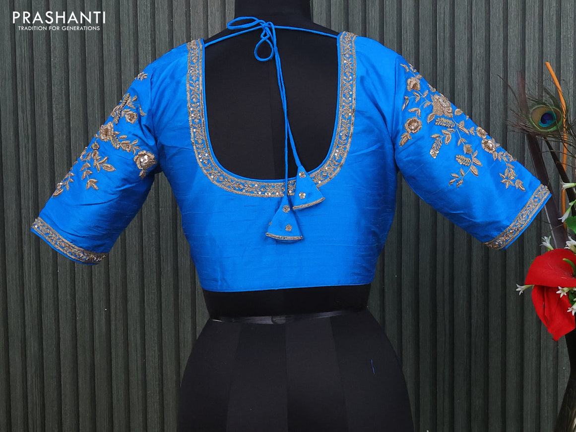 Raw silk readymade blouse cs blue with allover zardosi work and back knot