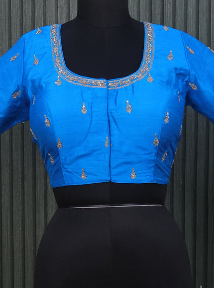 Raw silk readymade blouse cs blue with allover zardosi work and back knot