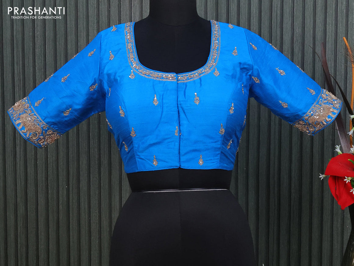 Raw silk readymade blouse cs blue with allover zardosi work and back knot