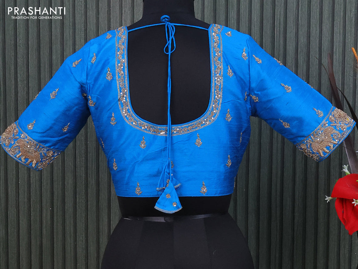 Raw silk readymade blouse cs blue with allover zardosi work and back knot