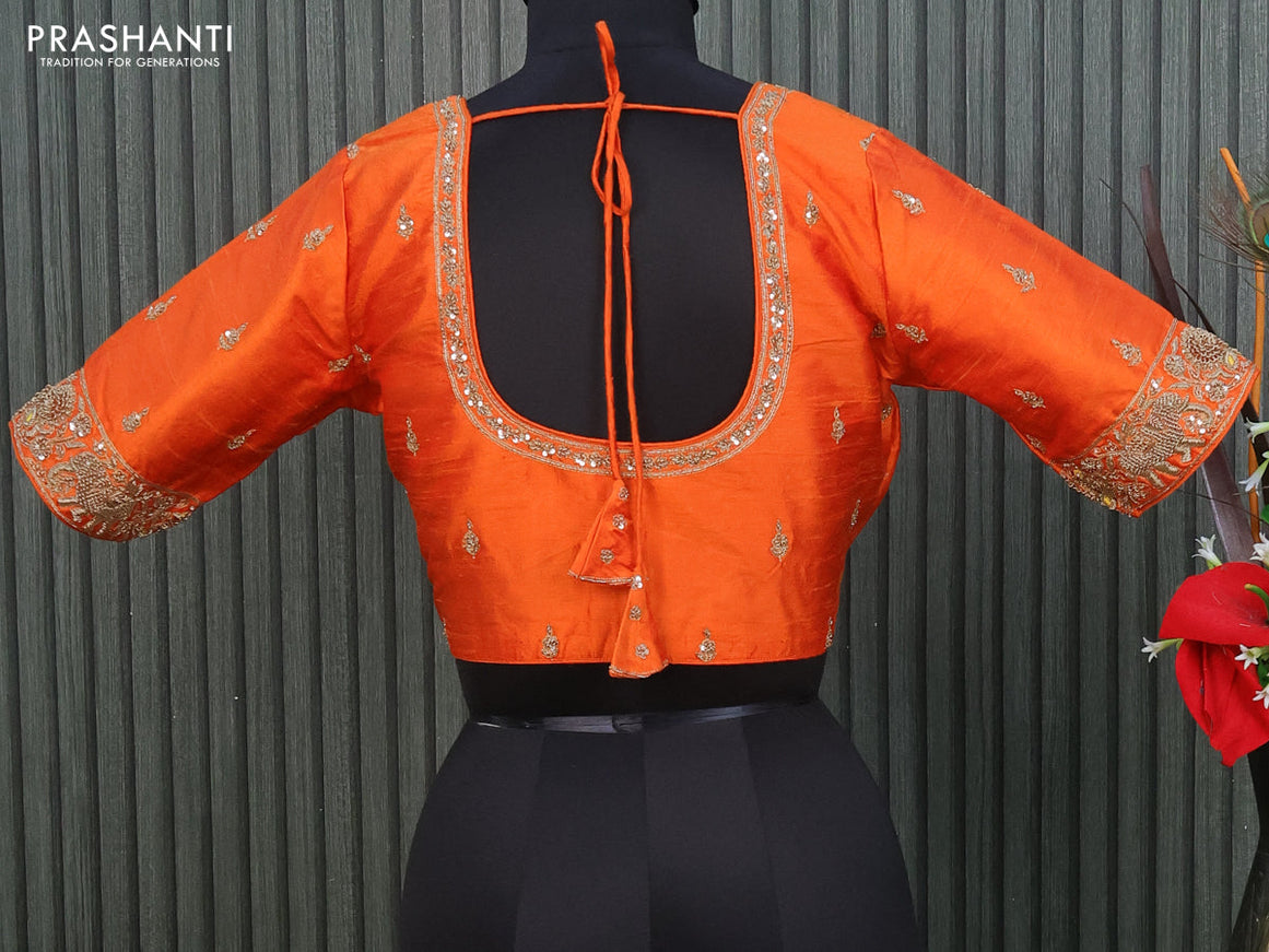 Raw silk readymade blouse orange with allover zardosi work and back knot