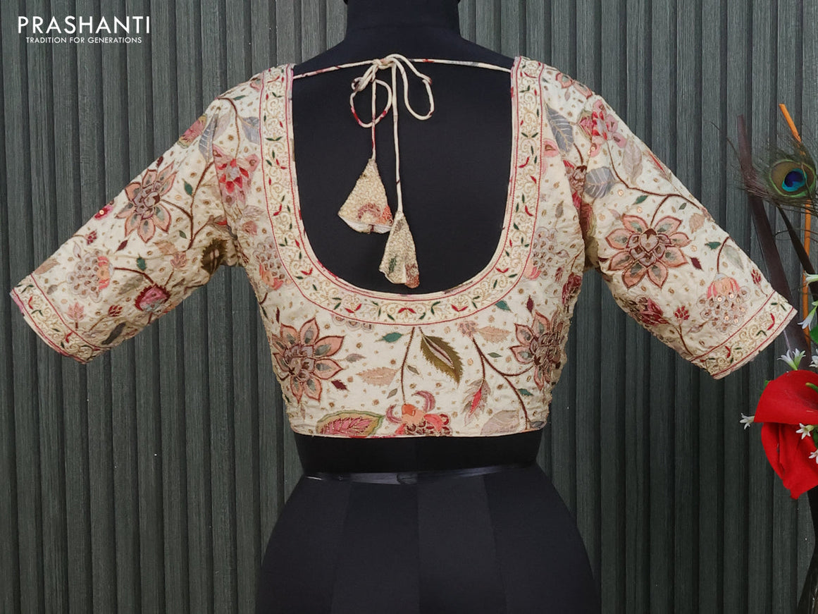 Silk digital readymade blouse cream with allover pen kalamkari prints & pita work and back knot