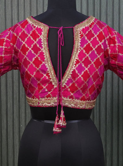 Banarasi silk readymade blouse pink and red with allover zari brocade weaves & embroidery work and back knot & v neck pattern