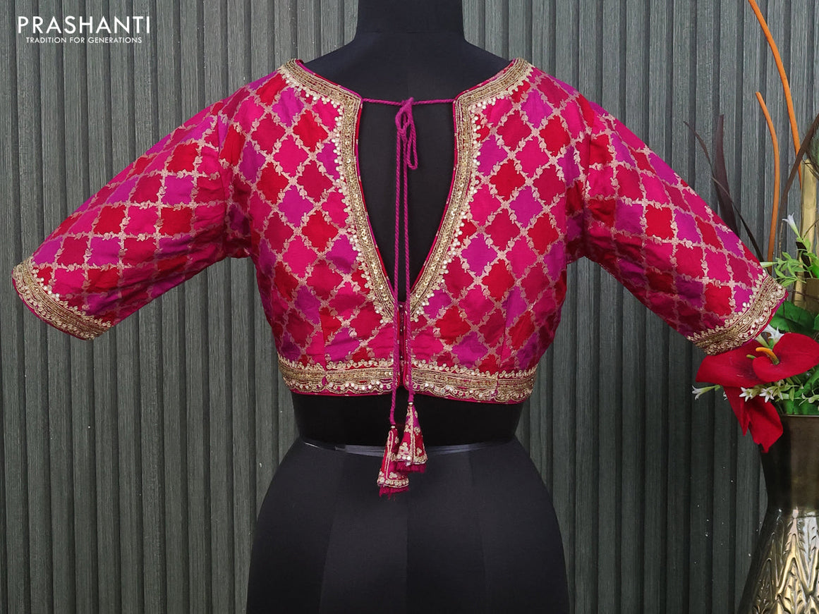 Banarasi silk readymade blouse pink and red with allover zari brocade weaves & embroidery work and back knot & v neck pattern