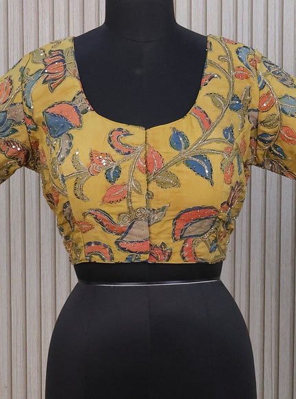 Silk pen kalamkari readymade blouse mustard shade with allover kalamkari prints & pita work and back knot