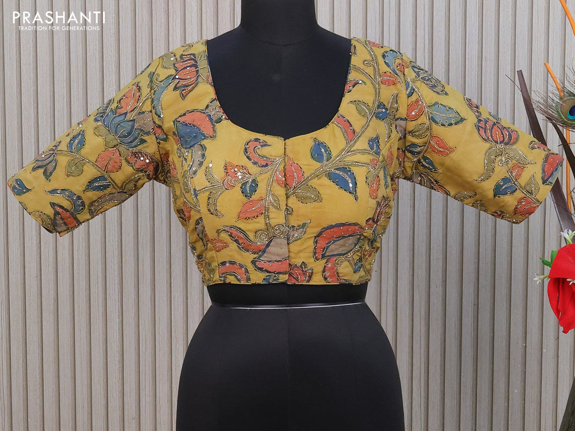 Silk pen kalamkari readymade blouse mustard shade with allover kalamkari prints & pita work and back knot