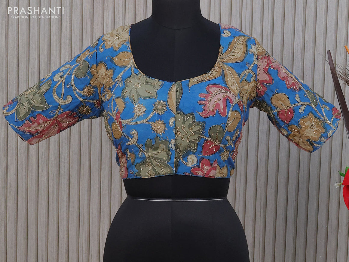 Silk pen kalamkari readymade blouse blue with allover kalamkari prints & pita work and back knot