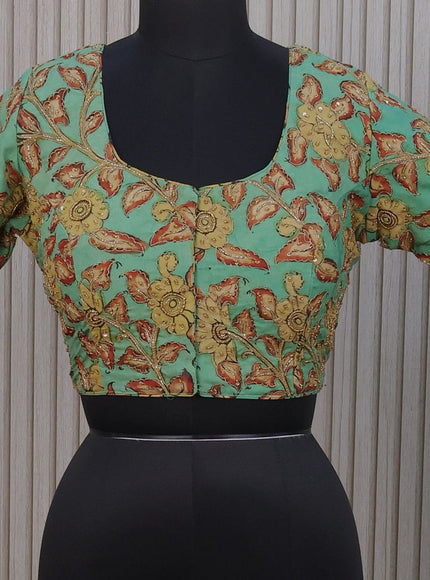 Silk pen kalamkari readymade blouse teal green shade with allover kalamkari prints & pita work and back knot