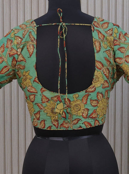 Silk pen kalamkari readymade blouse teal green shade with allover kalamkari prints & pita work and back knot