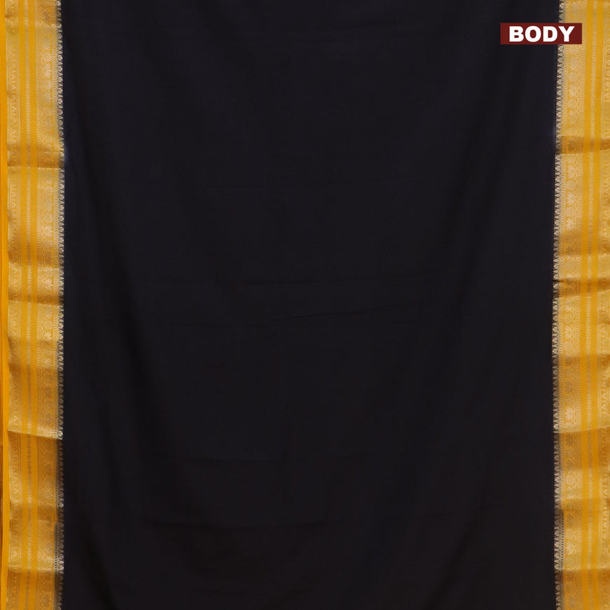 Semi crepe saree black and mango yellow with plain body and zari woven border