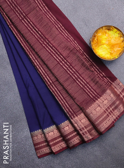 Semi crepe saree navy blue and deep maroon with plain body and zari woven border