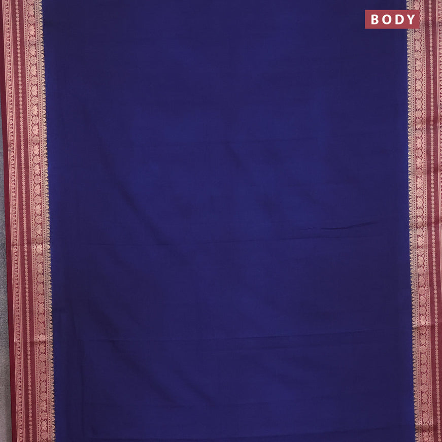 Semi crepe saree navy blue and deep maroon with plain body and zari woven border