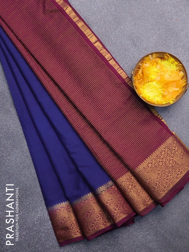 Semi crepe saree navy blue and deep purple with plain body and zari woven border