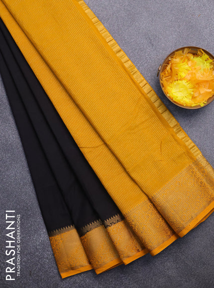 Semi crepe saree black and mango yellow with plain body and zari woven border