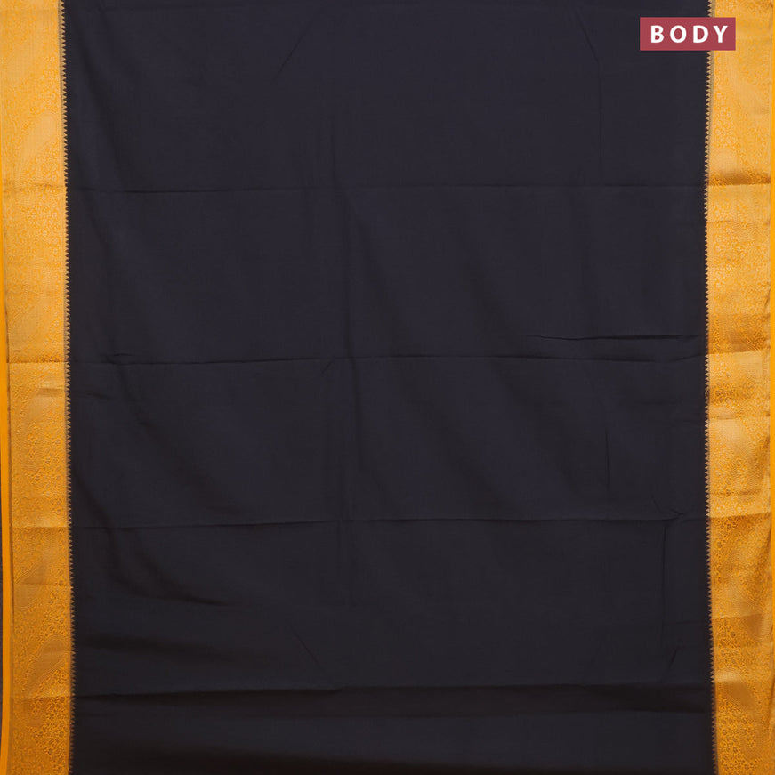 Semi crepe saree black and mango yellow with plain body and zari woven border