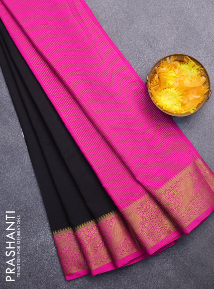 Semi crepe saree black and pink with plain body and zari woven border