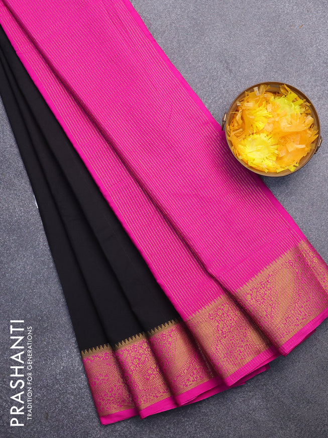 Semi crepe saree black and pink with plain body and zari woven border