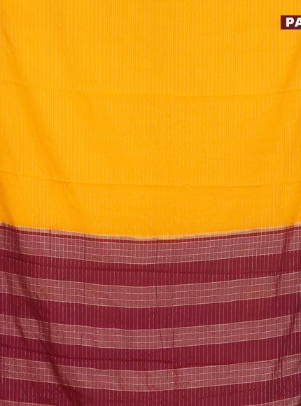 Semi crepe saree mango yellow and purple with allover zari stripe pattern and rettapet zari woven border