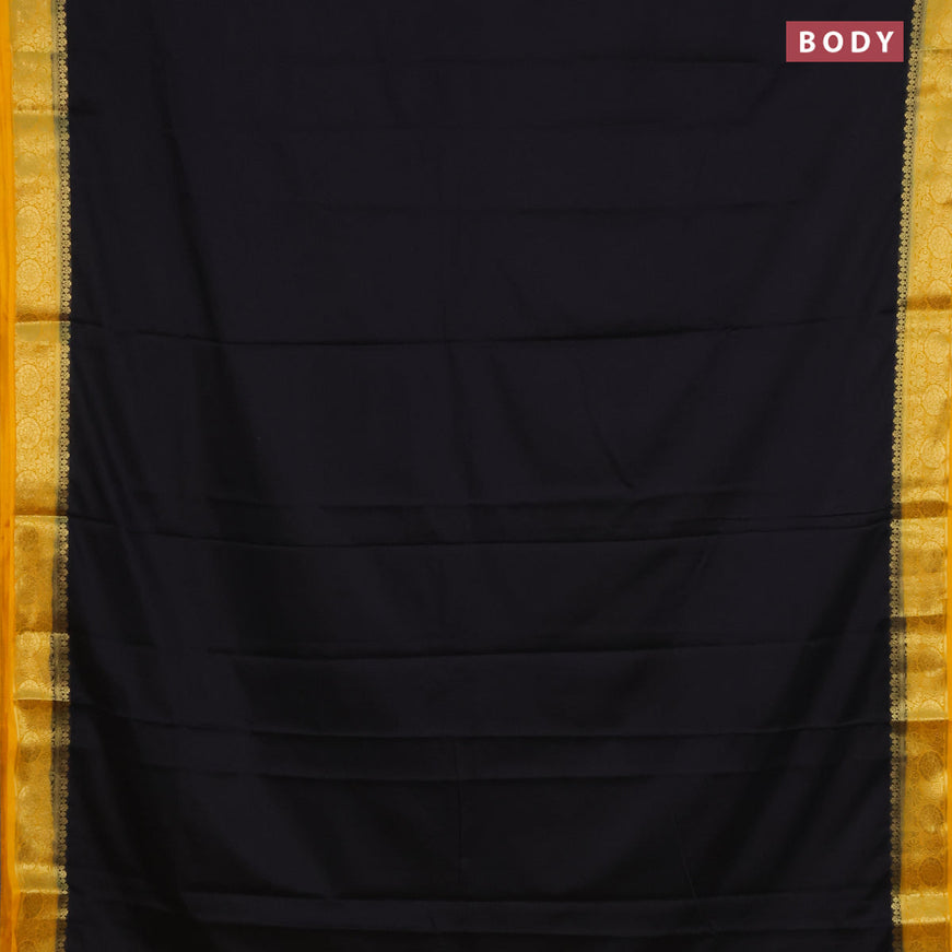 Semi crepe saree black and mango yellow with plain body and zari woven border