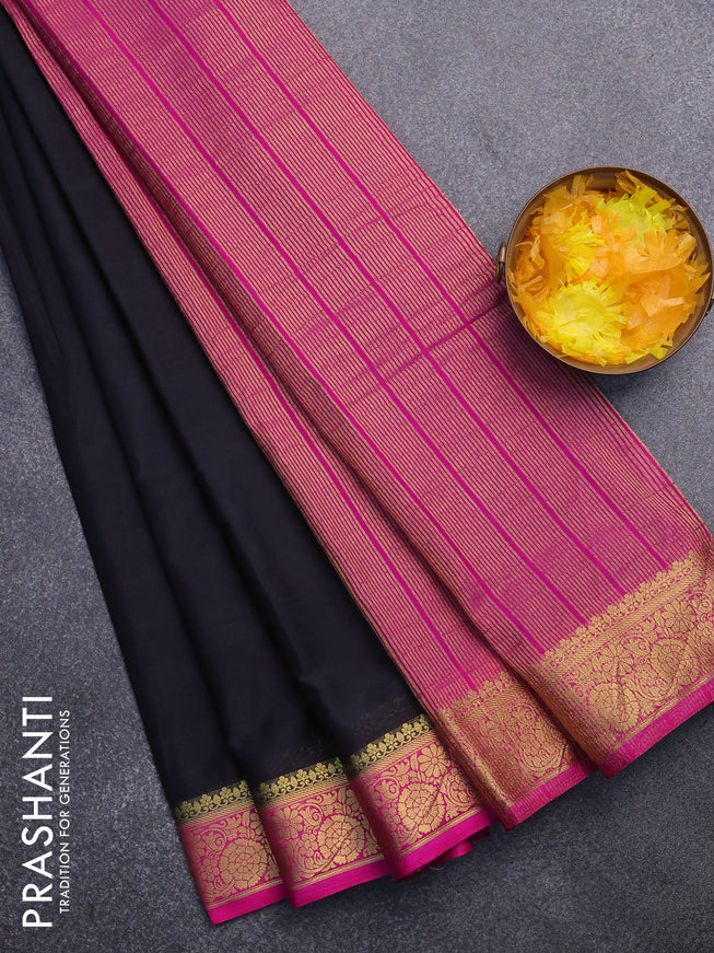 Semi crepe saree black and pink with plain body and zari woven border