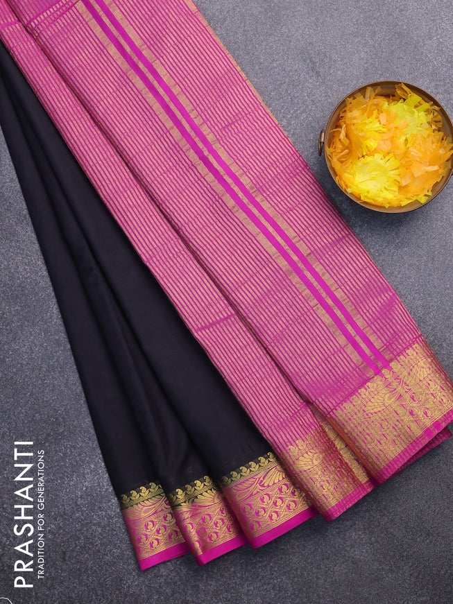 Semi crepe saree black and pink with plain body and zari woven border