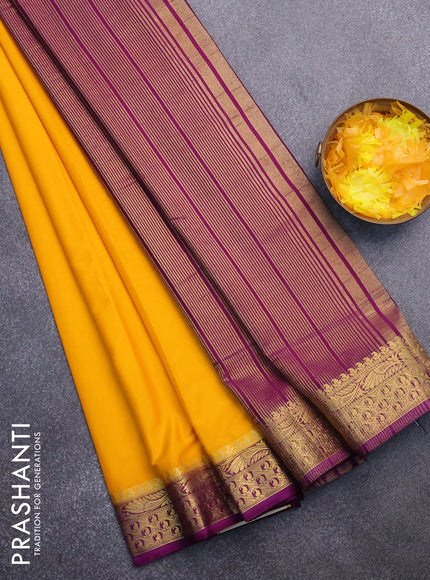 Semi crepe saree mango yellow and purple with plain body and zari woven border